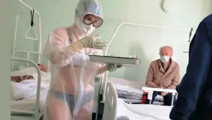 Fotografija medicinske sestre u providnom zaštitnom odijelu postala viralna - Avaz