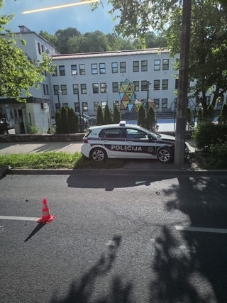After collision with another vehicle: Police car hits pole, Emergency services on scene