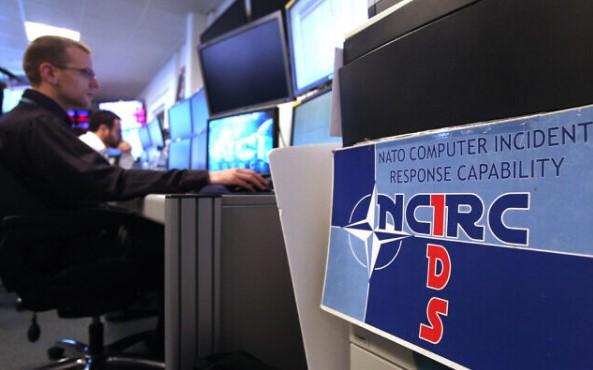 A computer expert operates at the NATO Computer Incident Response Capability (NCIRC) technical center, at NATO's military headquarters SHAPE in Mons, southwestern Belgium, December 10, 2013. - Avaz