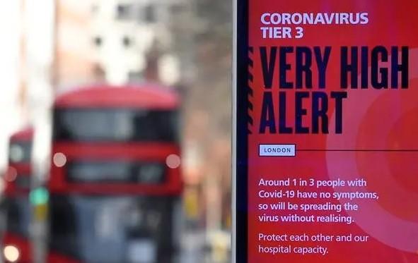 A British government health information advertisement highlighting new restrictions amid the spread of COVID-19 is seen in London, Britain, Dec 19, 2020. - Avaz