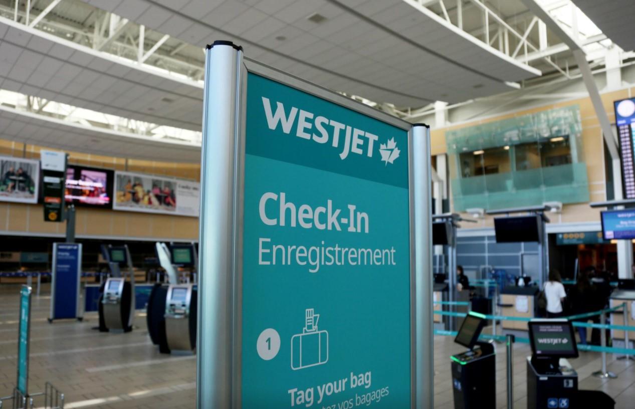 WestJet bars 10 passengers from boarding for improper virus test as Canadian rules start