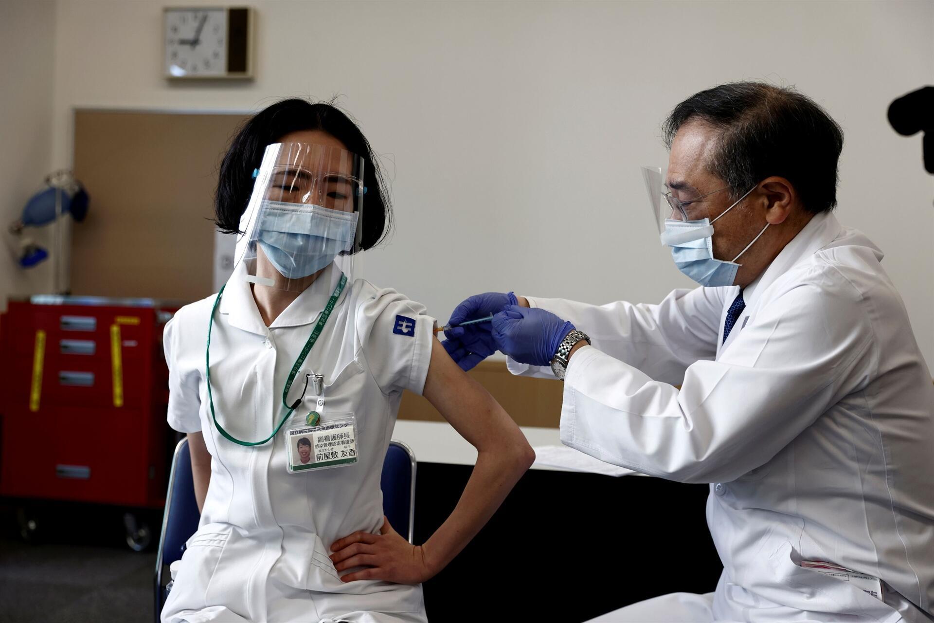 Japan starts vaccinations as new coronavirus cases, deaths drop worldwide