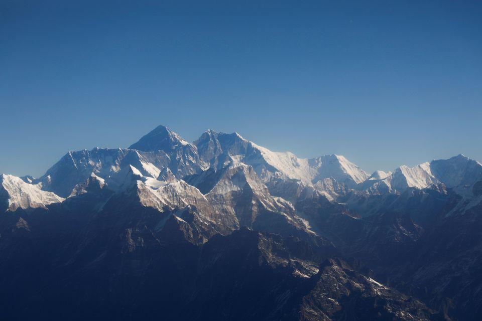 Mount Everest, the world highest peak, and other peaks of the Himalayan range are seen through an aircraft window during a mountain flight from Kathmandu, Nepal January 15, 2020. - Avaz