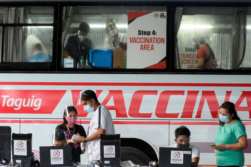 Philippines targets workers in next phase of COVID shots