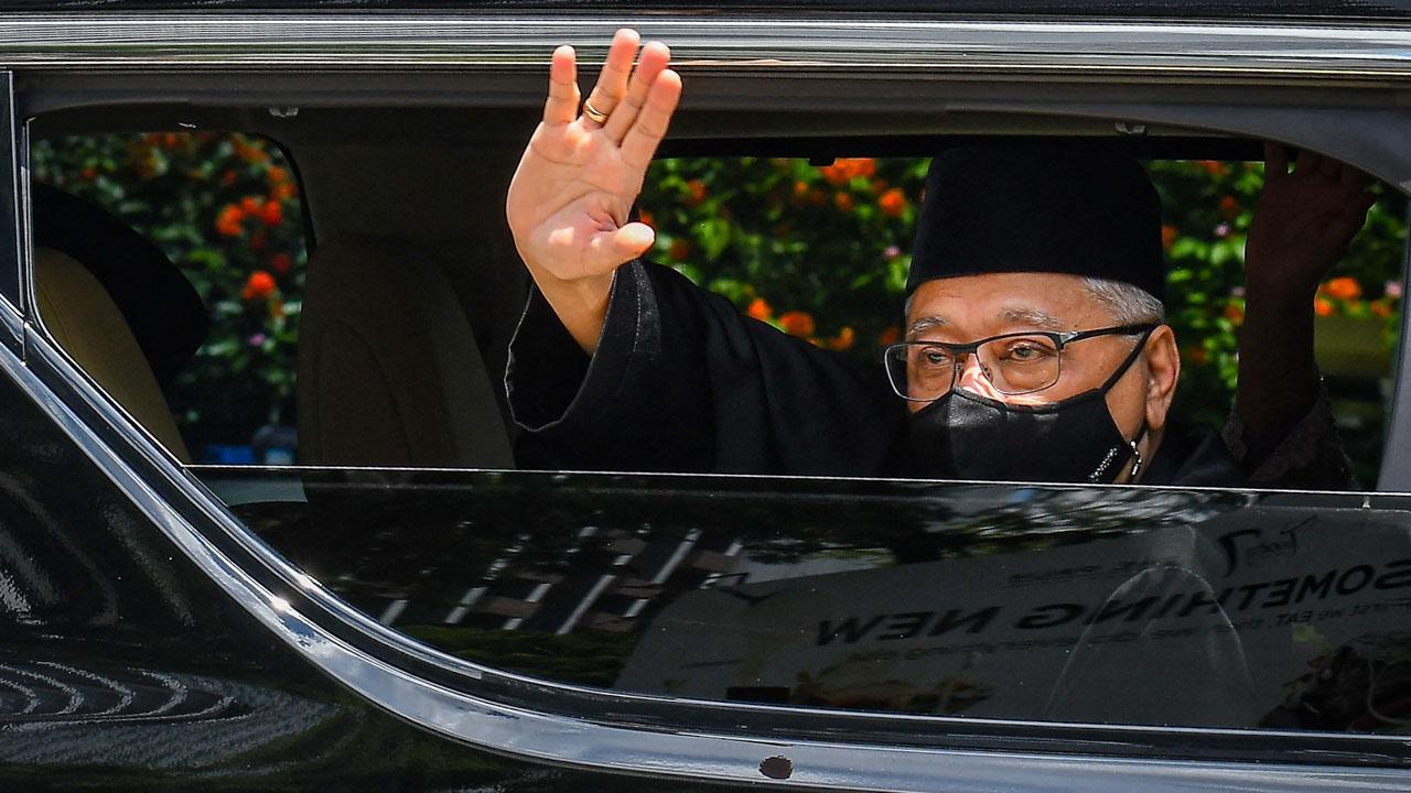 Malaysian PM misses cabinet swearing-in after Covid contact