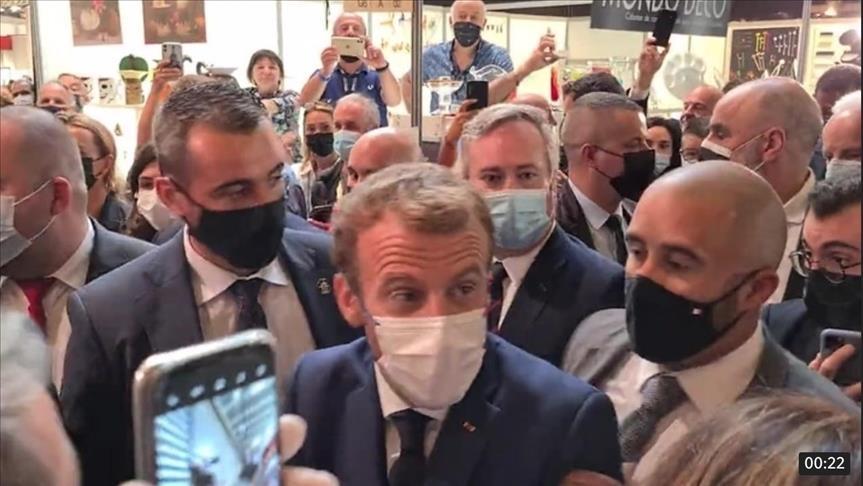 French President Macron pelted with egg at trade fair