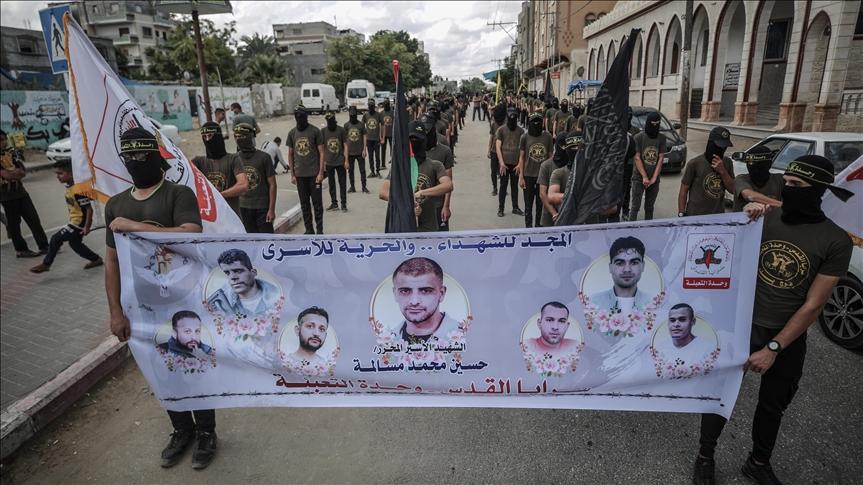 Members of the Palestinian Islamic Jihad Movement march from the Khan Yunis Refugee Camp in solidarity with Palestinian prisoners in Israeli jails, in Khan Yunis in the southern Gaza Strip on September 27, 2021. - Avaz