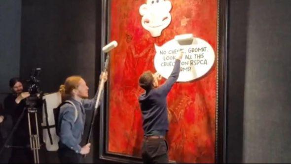 Aktivisti uništavaju portret kralja  - Avaz