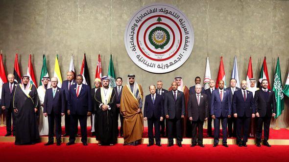  In this photo released by Lebanon's official government photographer Dalati Nohra, Lebanese President Michel Aoun, front row sixth from right, stands next to Qatar's Emir Sheikh Tamim bin Hamad Al Thani, fifth from left, and Mauritania's President Mohamed Ould Abdel Aziz, during a group picture with other leaders and head delegations, before the opening session of the Arab Economic Summit - Avaz