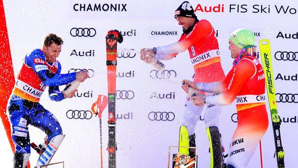 Switzerland's Ramon Zenhaeusern, center, winner of an alpine ski, men's World Cup slalom, celebrates on the podium with second-placed Greece's Aj Ginnis, left, and third-placed Switzerland's Daniel Yule, in Chamonix, France, Saturday - Avaz