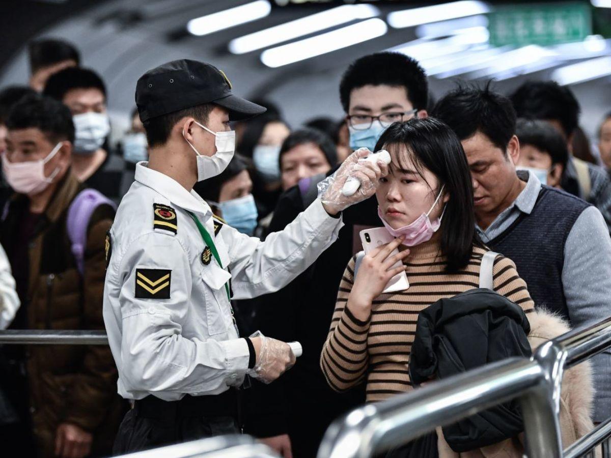 Oko 37 miliona ljudi u kineskim gradovima obuhvaćeno zabranom putovanja - Avaz