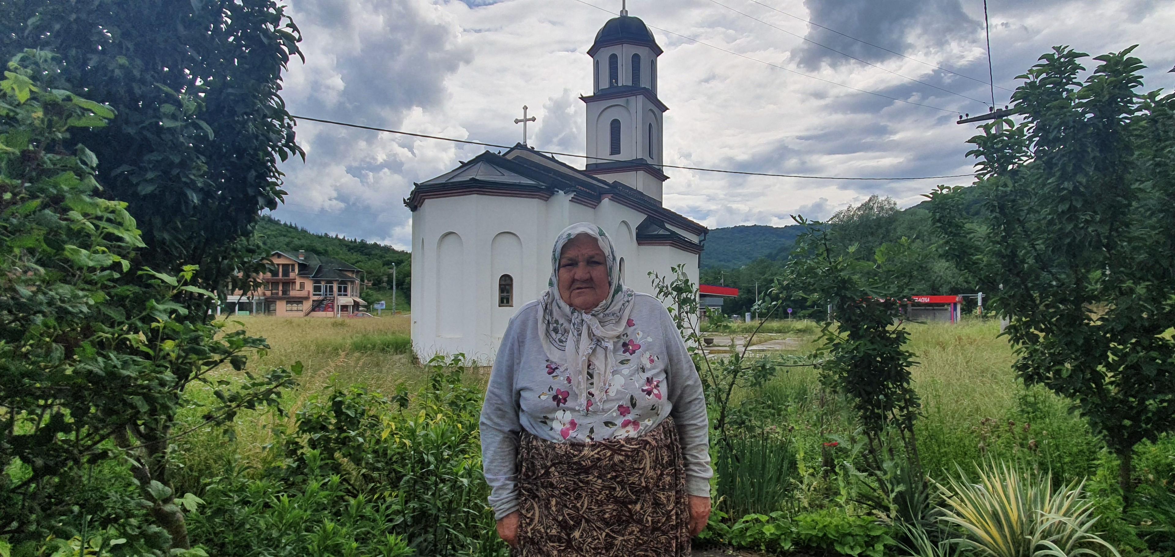 Fata Orlović in front of the church in her yard - Avaz