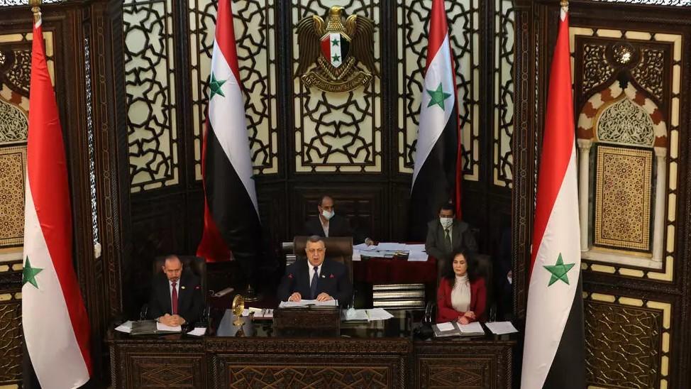 Hammouda Al-Sabbagh (C), head of the Syrian People's Assembly, presides over a parliamentary session to discuss upcoming presidential elections, in the capital Damascus, on April 18, 2021. - Avaz