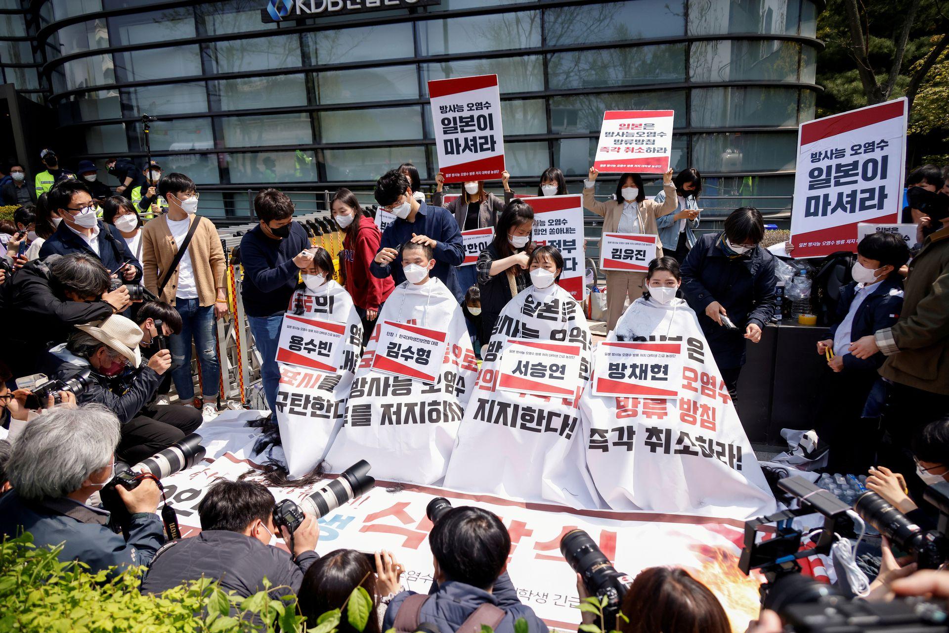 S.Korean students shave heads in protest over Japan's nuclear waste water plan
