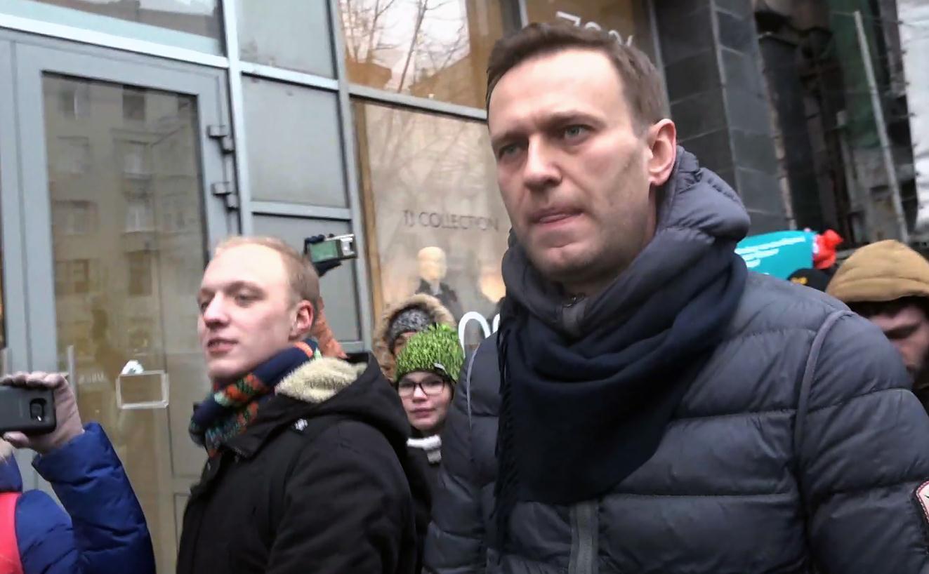 Russian police detain Navalny aides, activists before protests