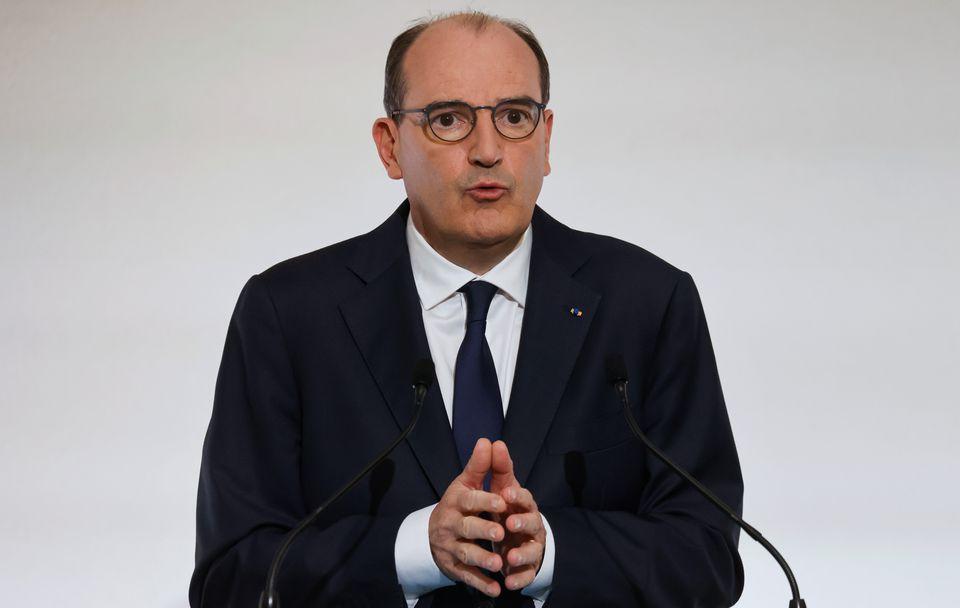 French PM calls killing of police worker an attack on nation