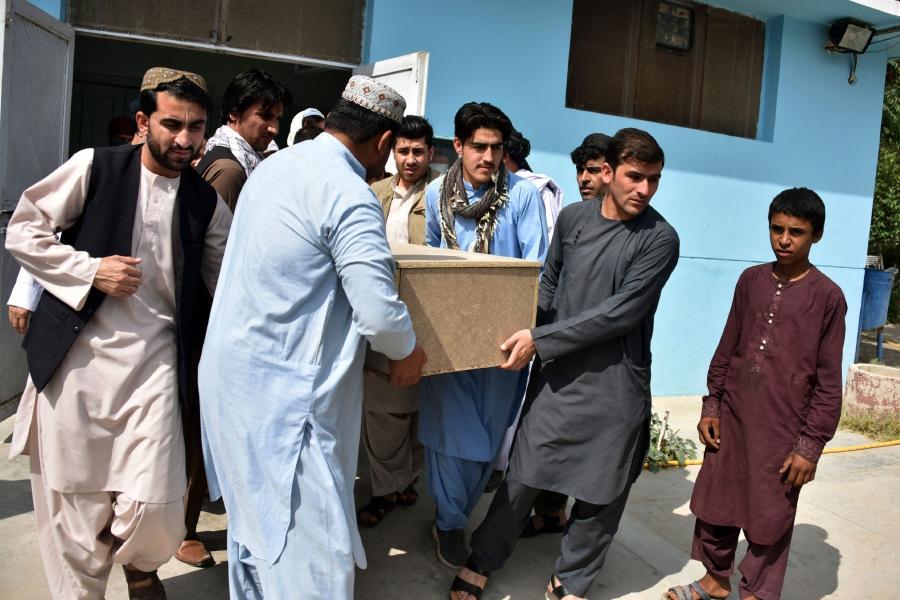 Relatives carry a coffin with the body of Nemat Rawan, a popular Tolo News talkshow host after he was shot dead by gunmen, in Kandahar Provicne on May 6, 2021. - Avaz