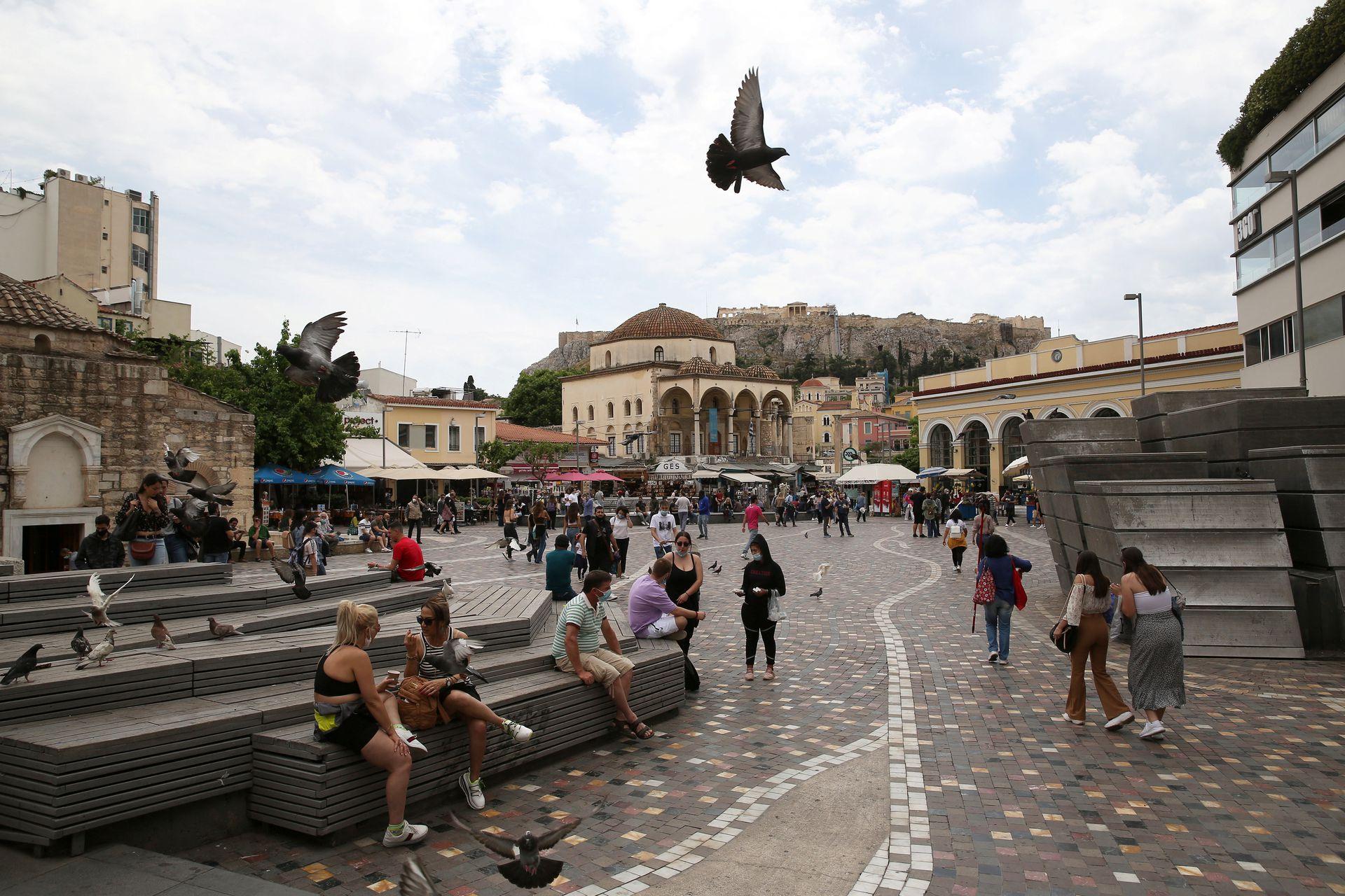 People make their way around Monastiraki square, as the country's tourism season officially opens, in Athens, Greece May 15, 2021. - Avaz