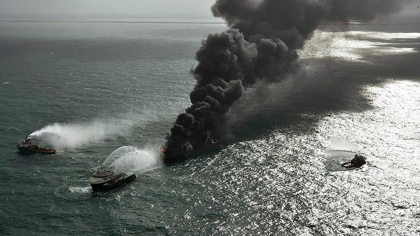 Sri Lanka battles fire on ship loaded with chemicals