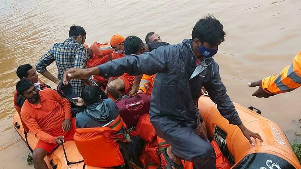 India begins landslide, flood clean-up as deadly monsoon rains ease