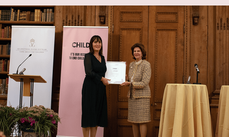 Queen Silvia of Sweden presents an award to Mostar's "Novi put" association