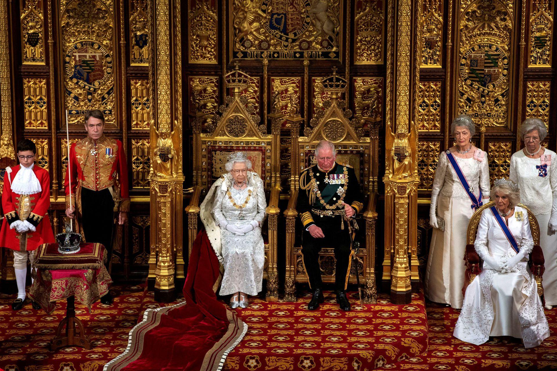 Britain's Queen Elizabeth, Charles, the Prince of Wales and Camilla, Duchess of Cornwall are seen during the State Opening of Parliament in the House of Lords at the Palace of Westminster in London, Britain October 14, 2019. - Avaz