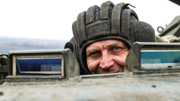A Ukrainian soldier looks out of an APC during combat training in Zaporizhzhia region, Ukraine, Tuesday, Jan. 24, 2023. - Avaz