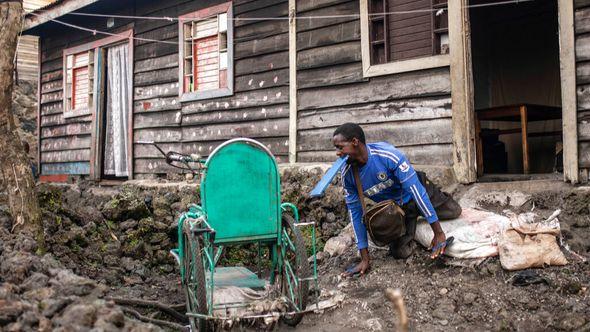 Paul Mitemberezi, a market vendor who has been disabled since he was 3 because of polio, leaves his house for the North Kivu Paralympic League, in Goma - Avaz