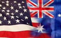 Australia on Monday signed an agreement with the US and the UK to access classified nuclear submarine information under their AUKUS security partnership