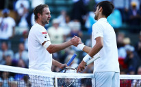 Tenis Sandgren i Novak Đoković