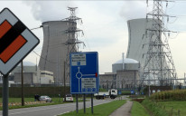 People gather to against the shutdown of the Doel 3 reactor in Brussels, Belgium on September 23, 2022.