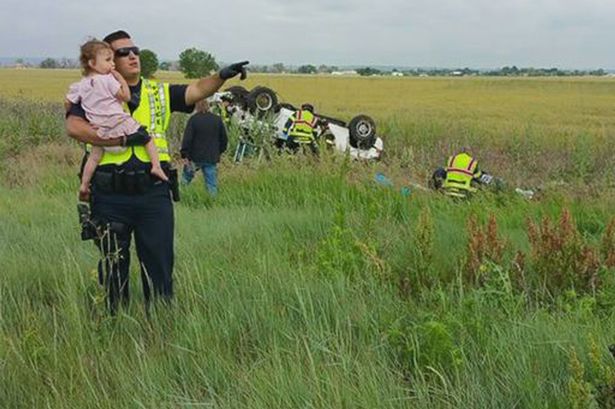 colorado-officer-comforts-child-after-fatal-crash